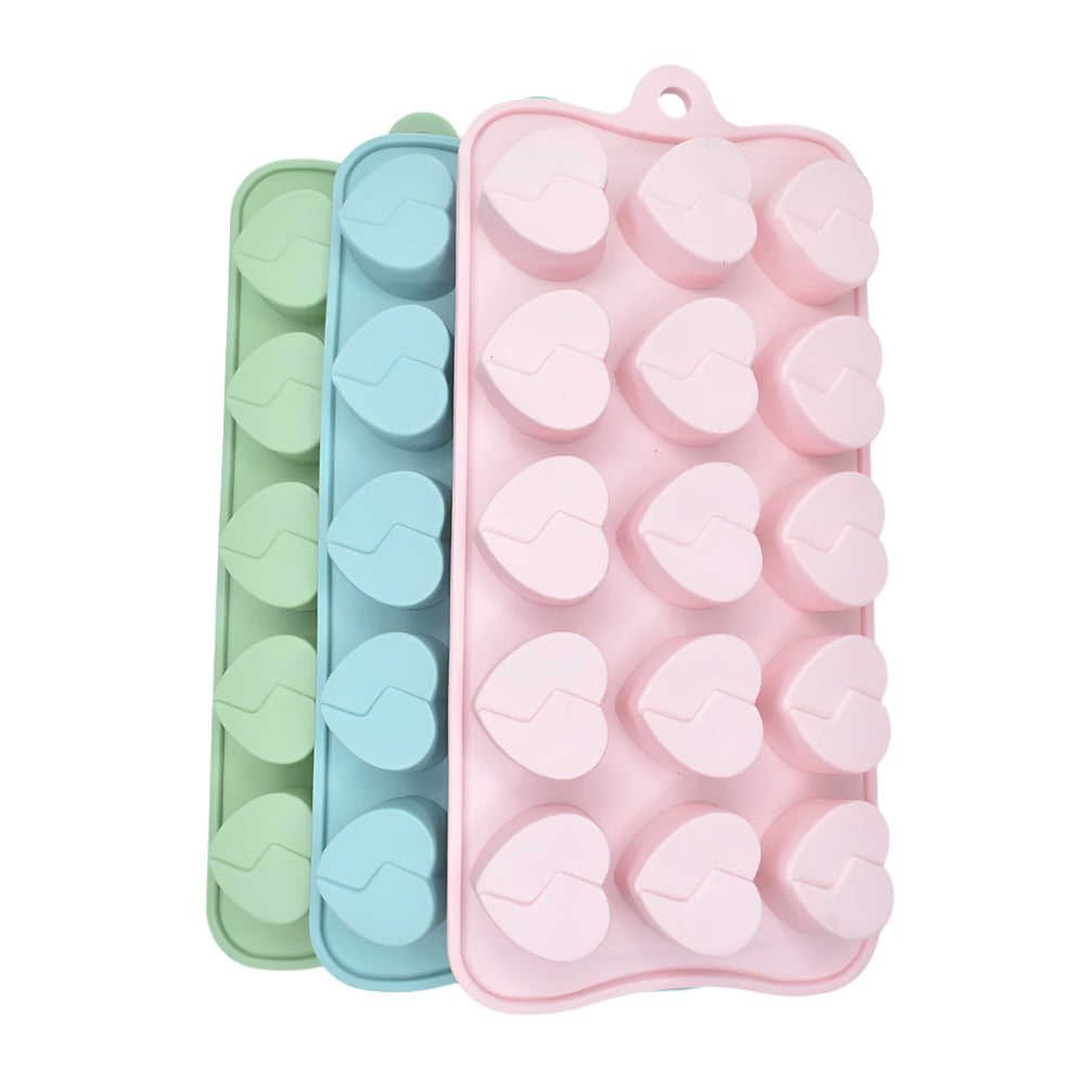 Big Broken Hearts Chocolate Mold in pink, blue, and green on white background