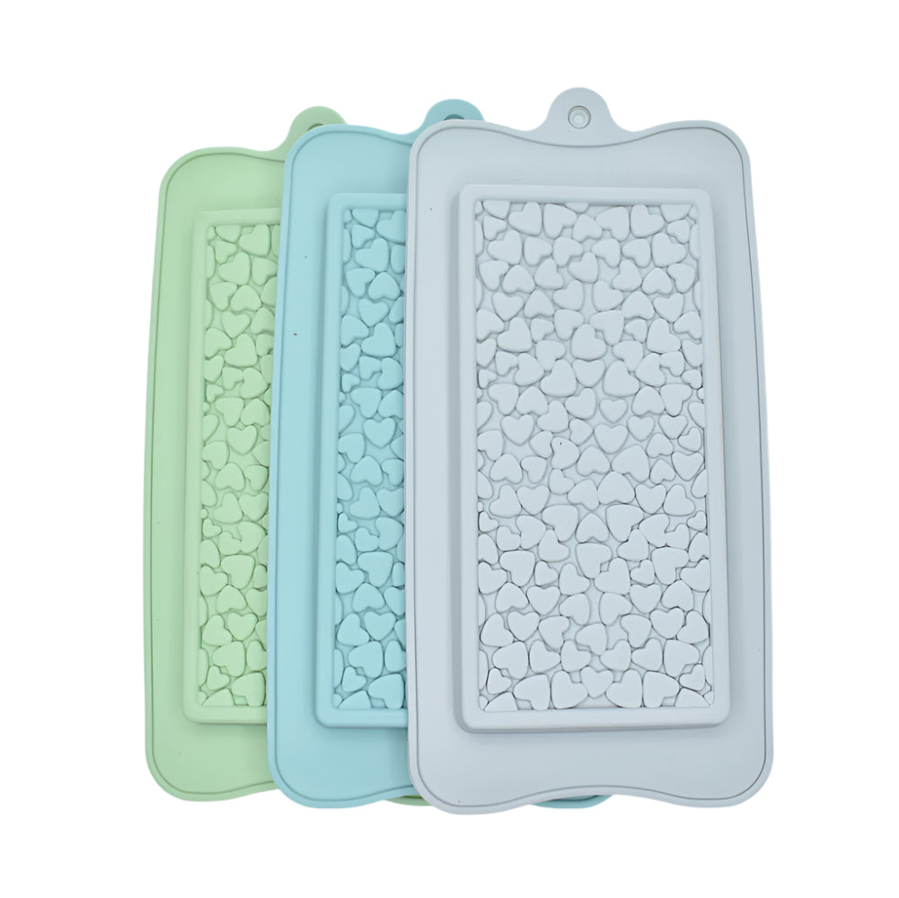 Gray, blue, and green Mini Hearts Chocolate Molds stacked on a white background for clear view. Perfect for creating small heart-shaped chocolates.