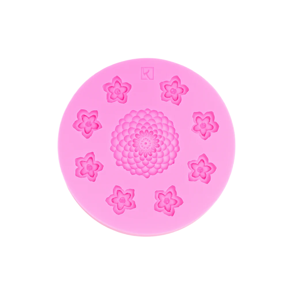 Pink silicone mold with floral designs on a white background
