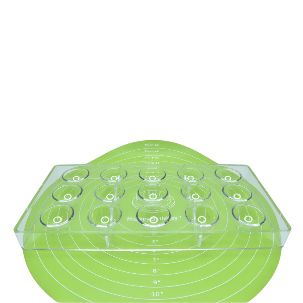 15 in 1 Round Shaped Polycarbonate Chocolate Mold placed on a green baking mat against a white background for a detailed view.