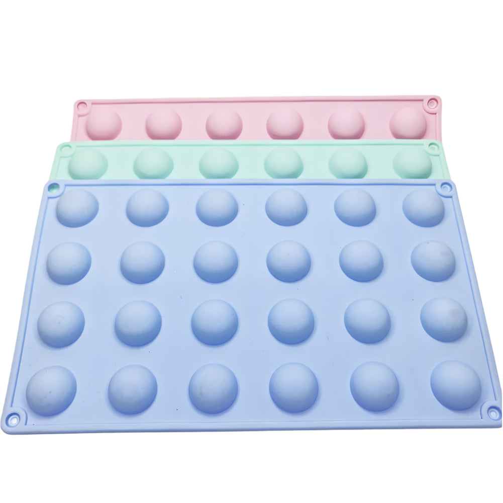 24 in 1 Chocolate Mold in blue, green, and pink on a white background for clear view