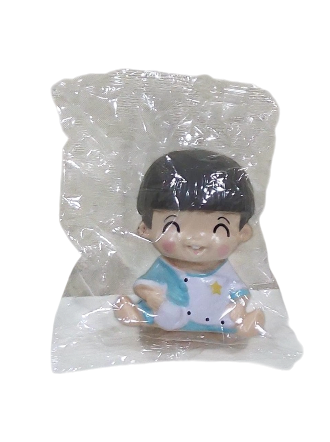 Cute Baby Cake Topper Set with Feeding Bottle in a blue outfit inside clear transparent packaging on a white background