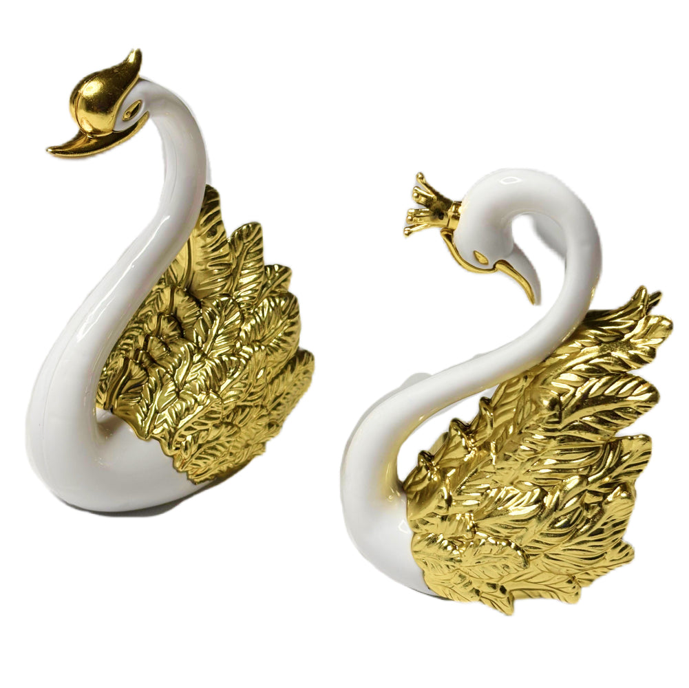 Close-up angled view of 2 Swan Cake Toppers on white background