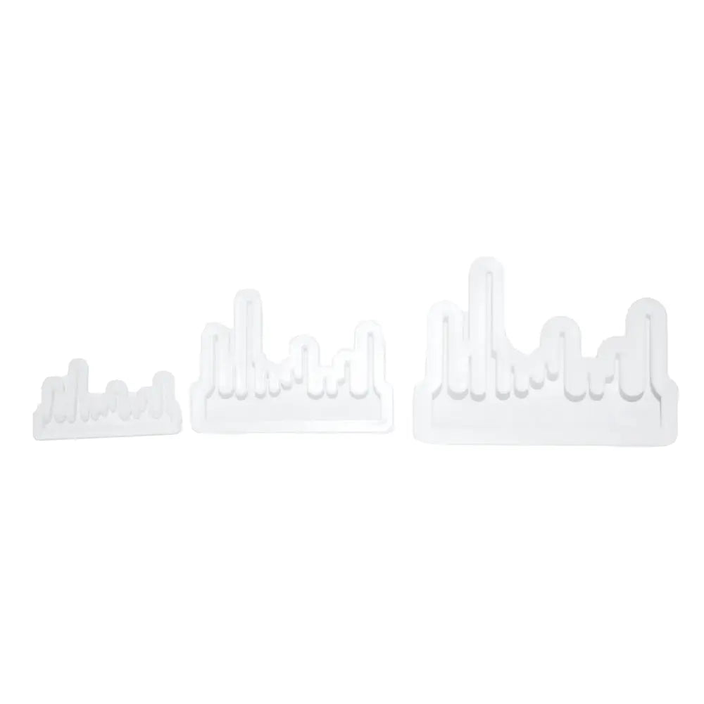 Neatly aligned 3 Pieces Drip Cutter cutouts on a clean white background