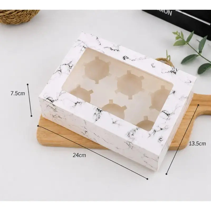 Marble-patterned soap mold on a wooden board with measurements indicated