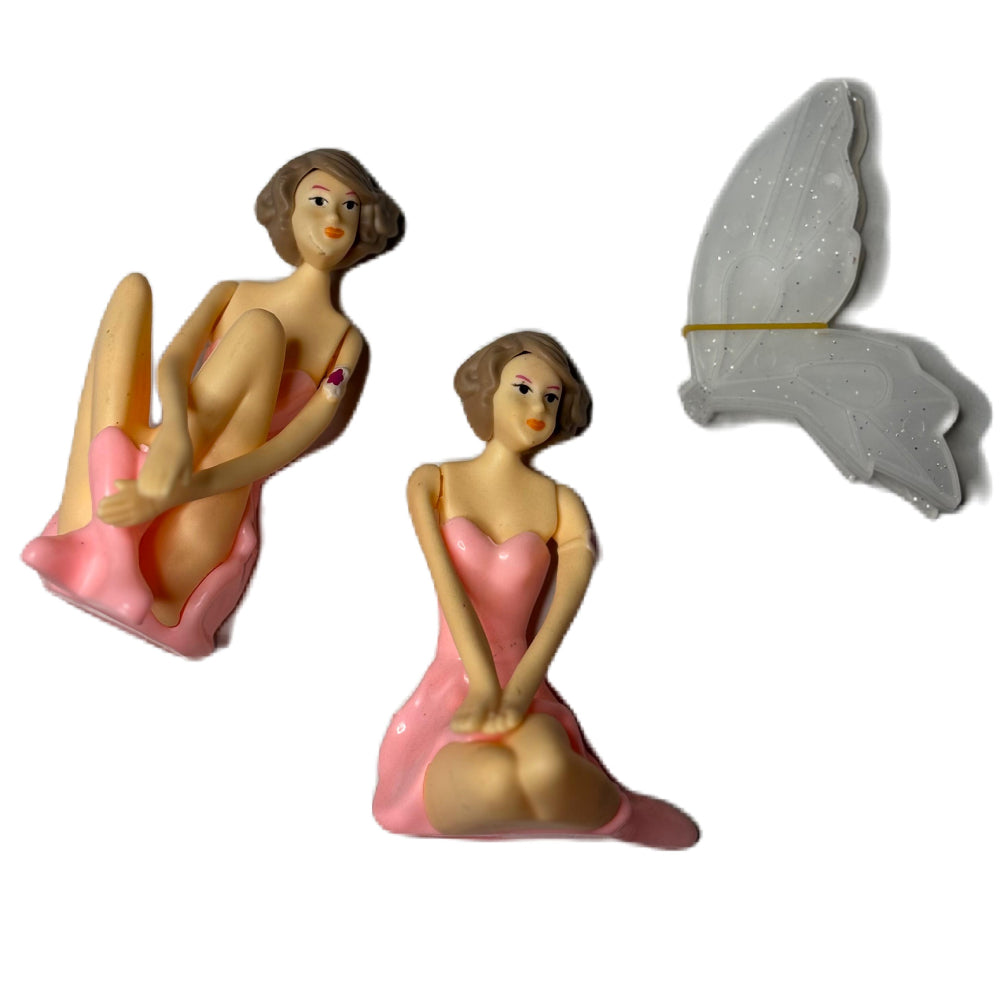 Two Pink Fairies Doll Cake Toppers lying flat with wings visible on white background