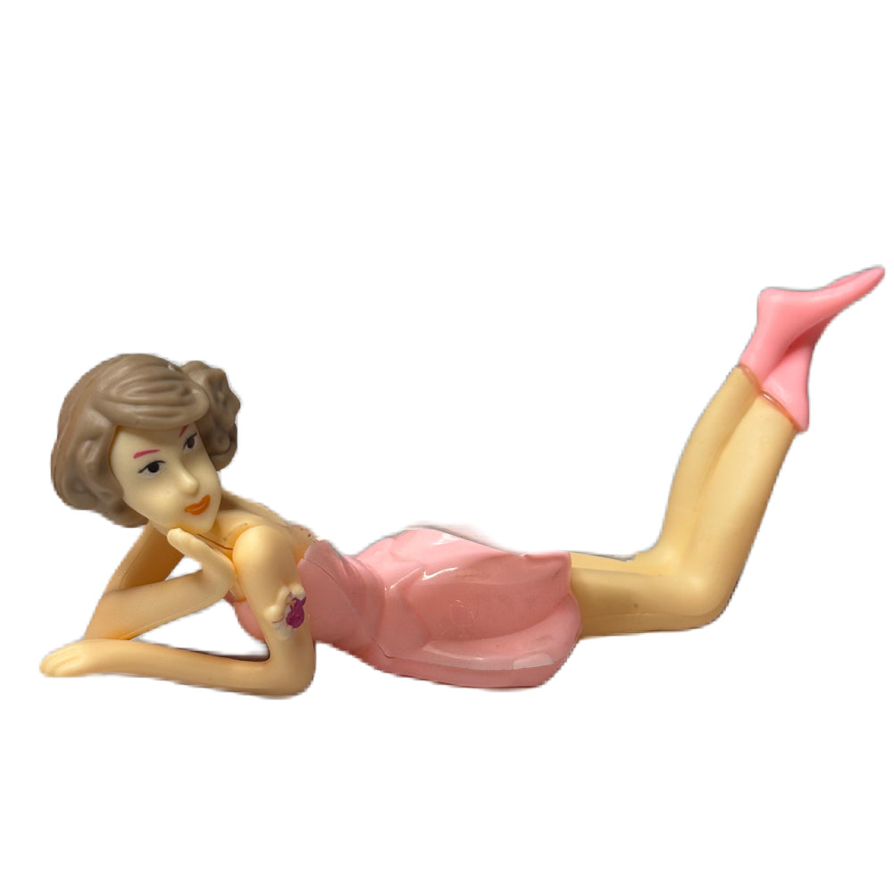 Close-up angled view of Pink Fairy Doll Cake Topper on white background.