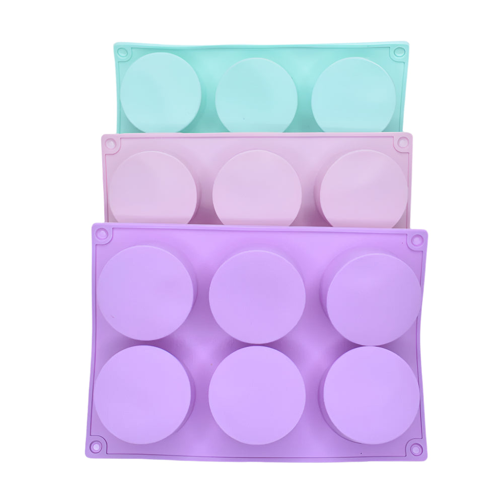 6 in 1 Big Muffins Chocolate Mold in purple, pink, and green stacked on a white background for clear view