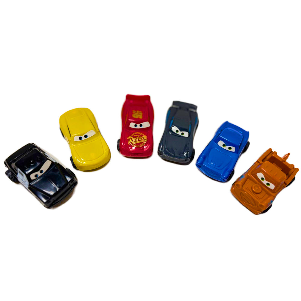 Close-up angled view of 6 Cars Toy Cake Toppers on white background