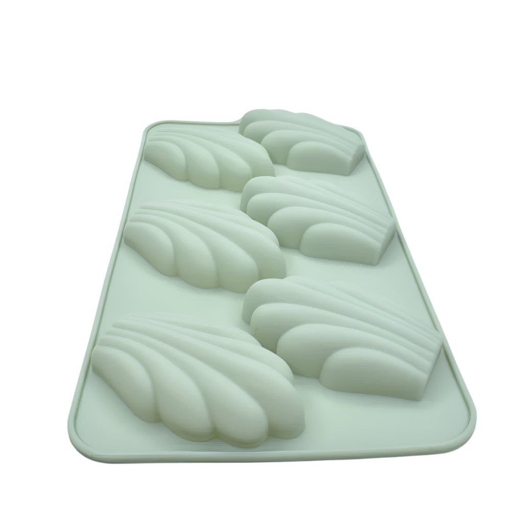 6 in 1 Madeleine Chocolate Mold viewed from a different angle on white background