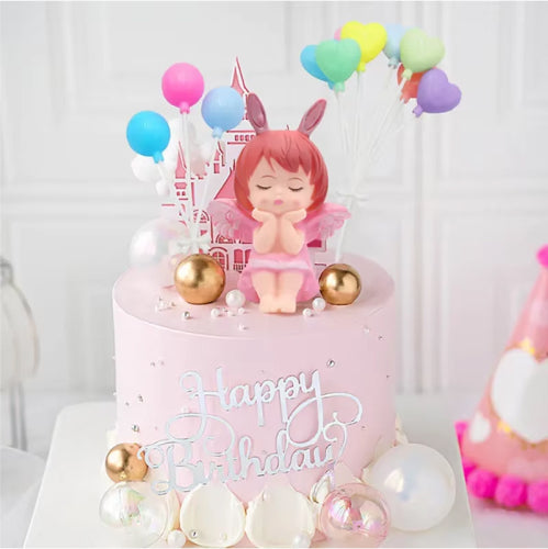 8 Piece Heart Shaped Plastic Balloon Cake Topper used to decorate a cake, showcasing its placement on a cake.