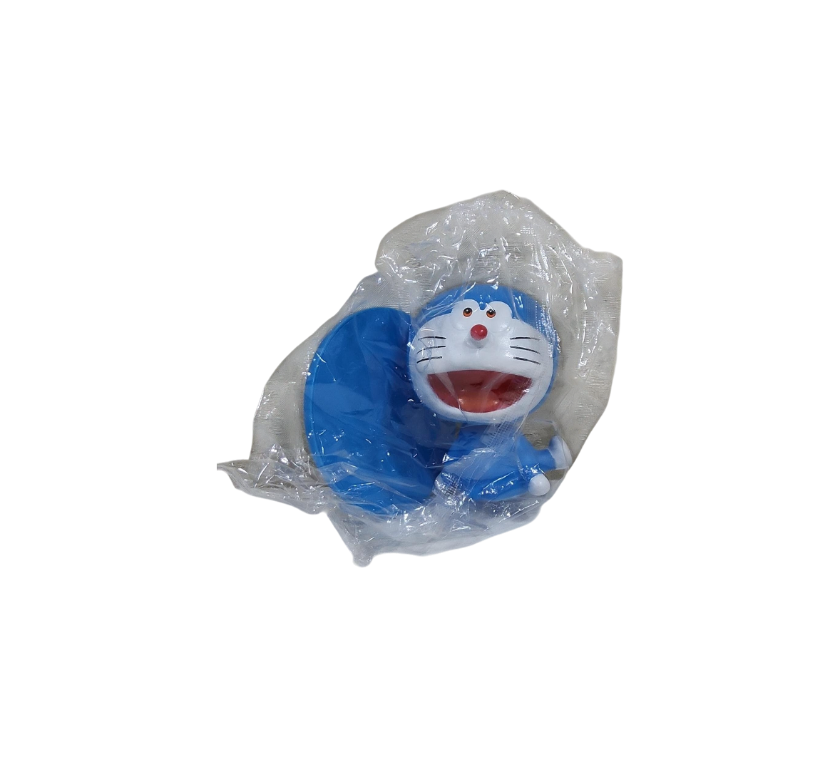 Doraemon Bobble Head Cake Topper – Spring Neck Moving Figurine (Soft Rubber) in clear transparent packaging on a transparent background