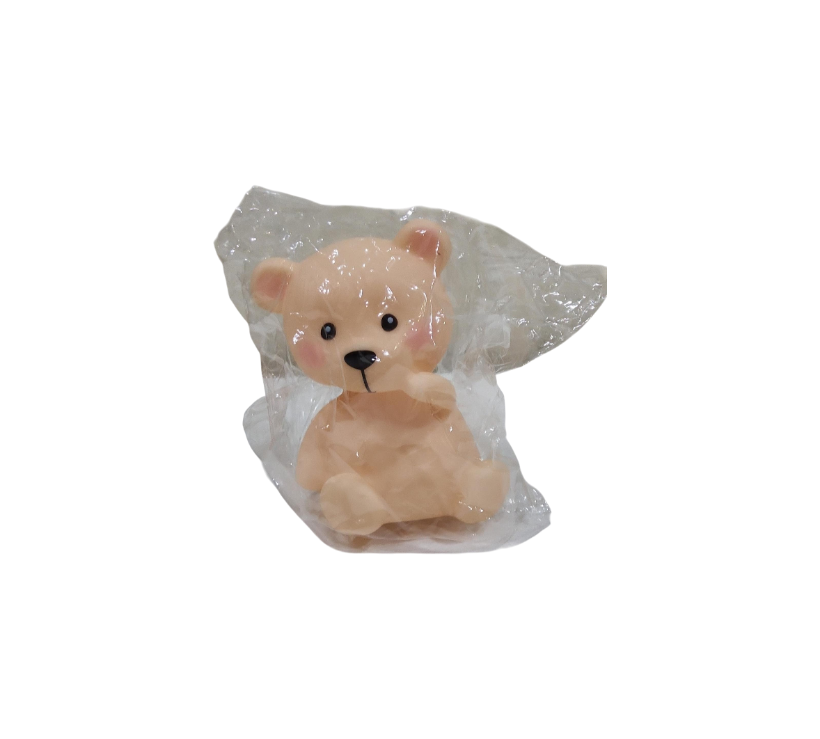 Small teddy bear in a transparent plastic bag on a transparent background