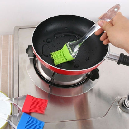 Big Plastic Transparent Silicone Brush being used in a pan for precise application