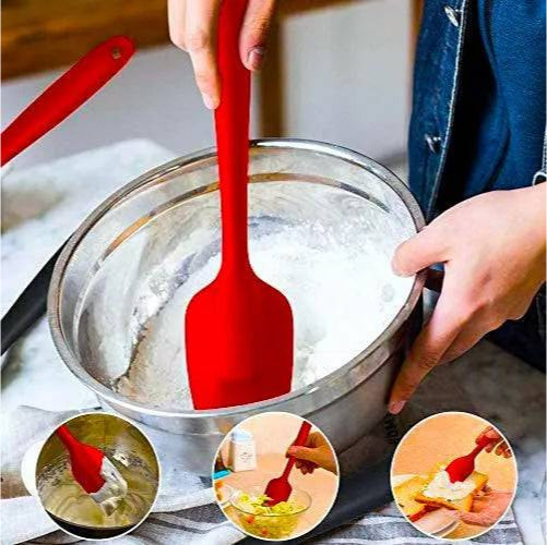 Image displays the Big Silicone Spatula scraping frosting from a container, illustrating its precision and ease of use.