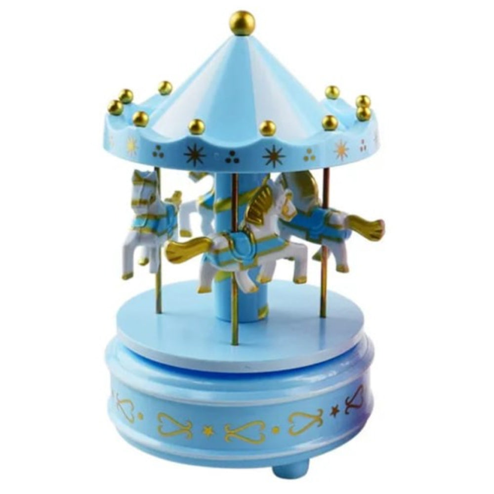 Close-up of Blue Carousel Cake Toy Topper on white background
