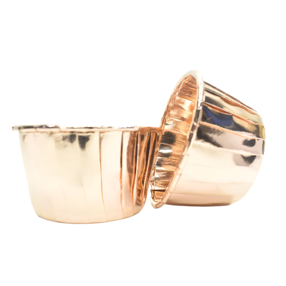 Two Bronze Baking Cups 50-Piece Packets placed side by side on a white background.