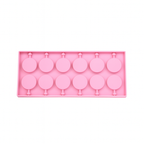 Pink silicone chocolate mold with lollipop shapes on a white background