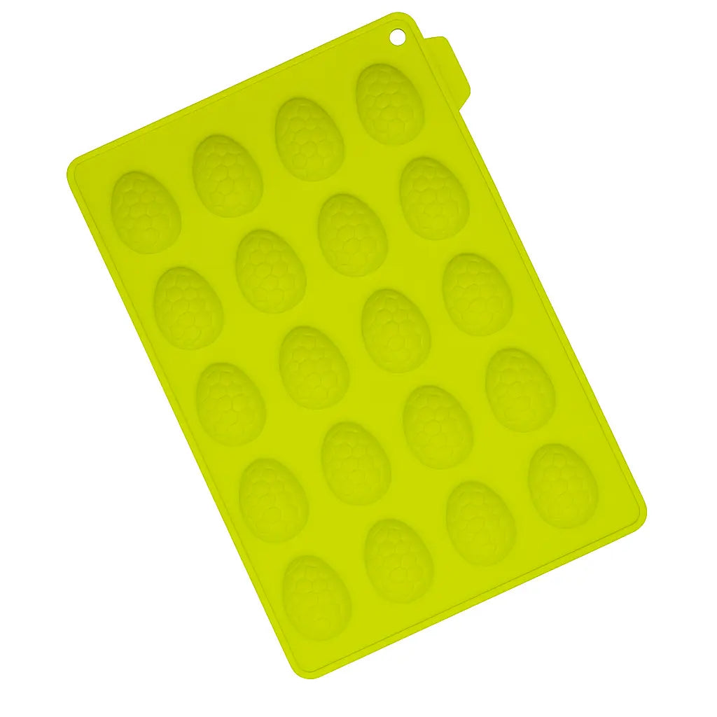 Green silicone chocolate mold with egg shapes, easter-themed on a white background