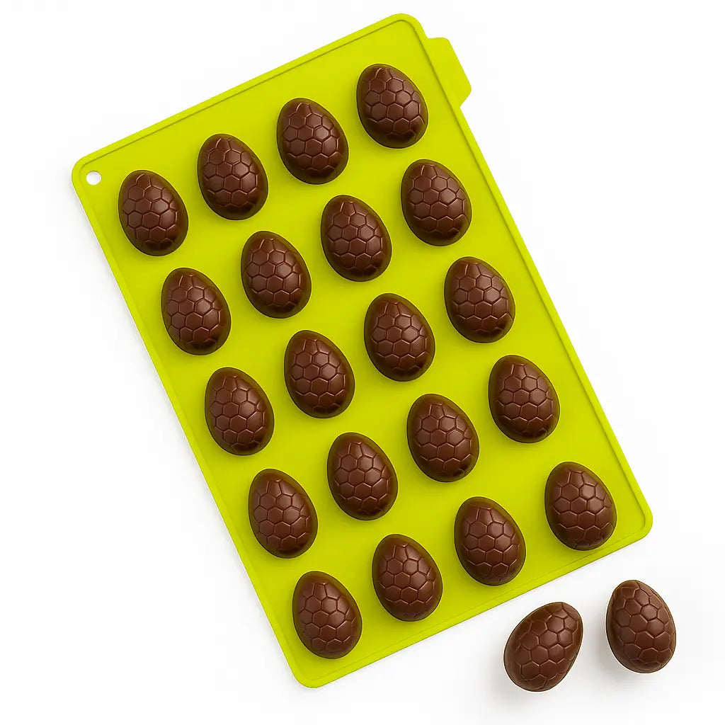 Silicone chocolate easter egg-themed mold with chocolate egg shapes on a white background