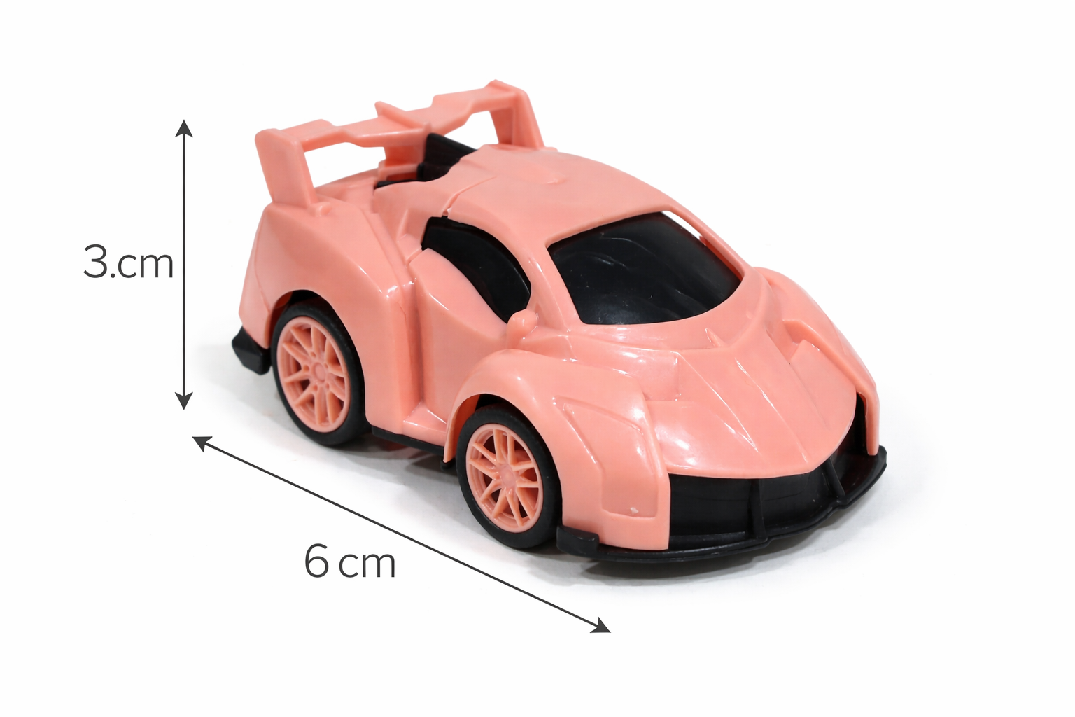 Small pink car cake toy Topper with dimensions indicated on a white background