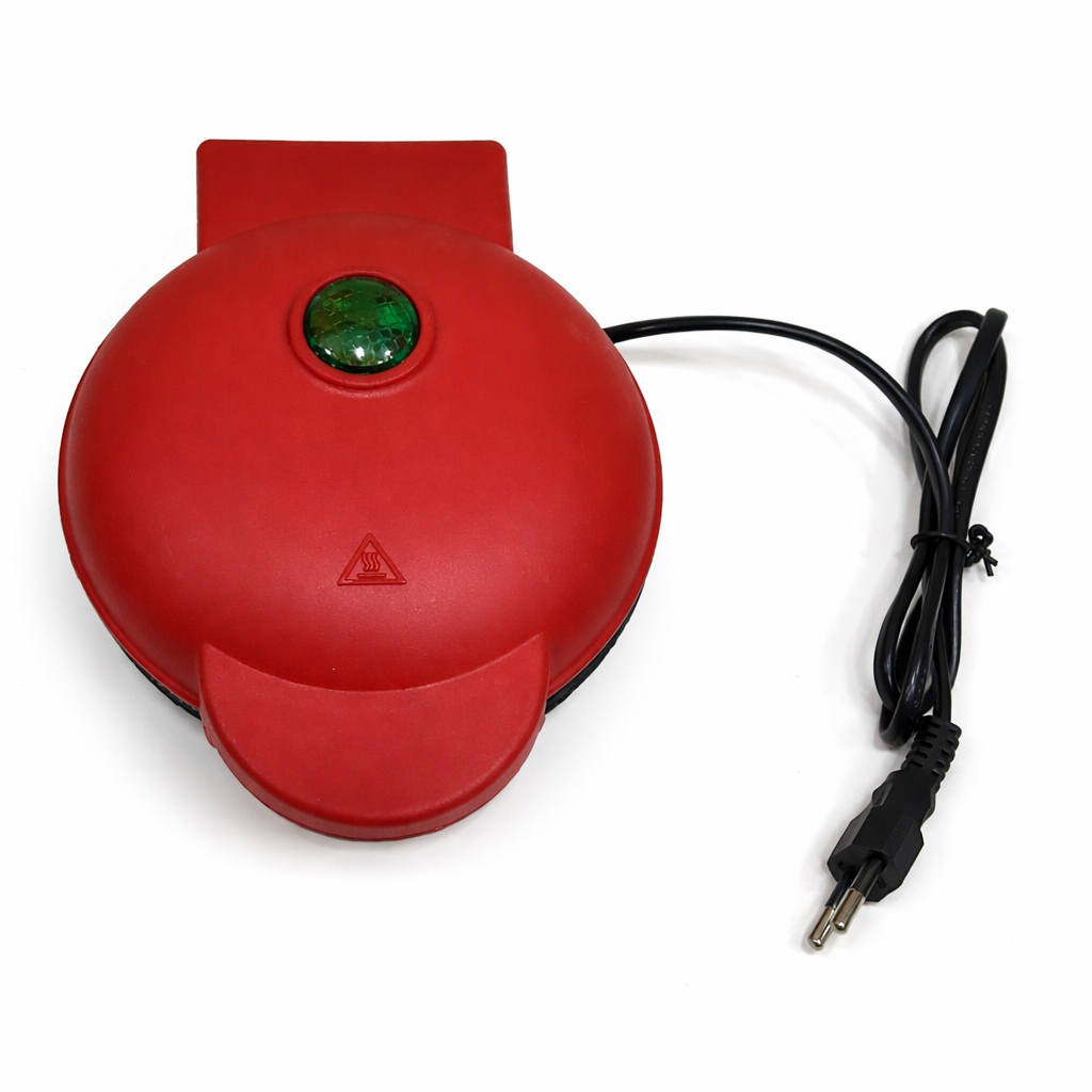 Red circular Waffle Machine  with a green light and black cord on a white background