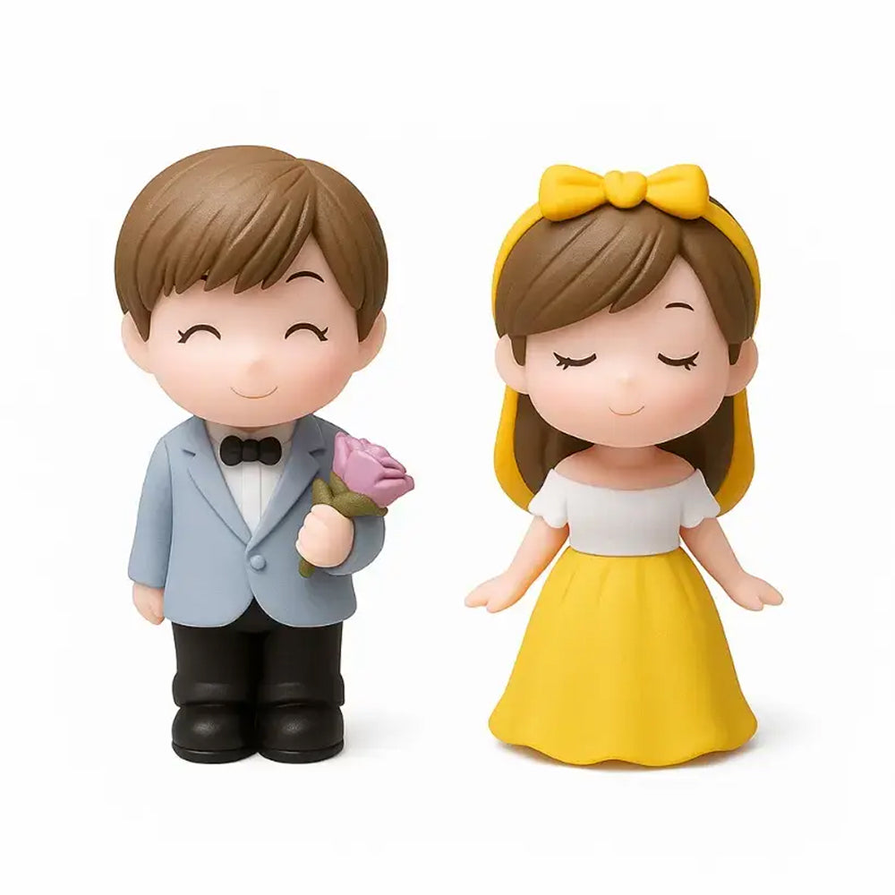 Miniature romantic couple figurines – boy in light blue blazer holding flower and girl in white top with yellow dress and bow, perfect for wedding cake toppers and anniversary decorations.