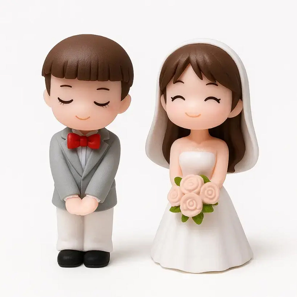 Bride and groom plastic cake topper set – smiling figurines with groom in grey suit and red bowtie and bride in white wedding gown holding rose bouquet, perfect for wedding or anniversary cakes