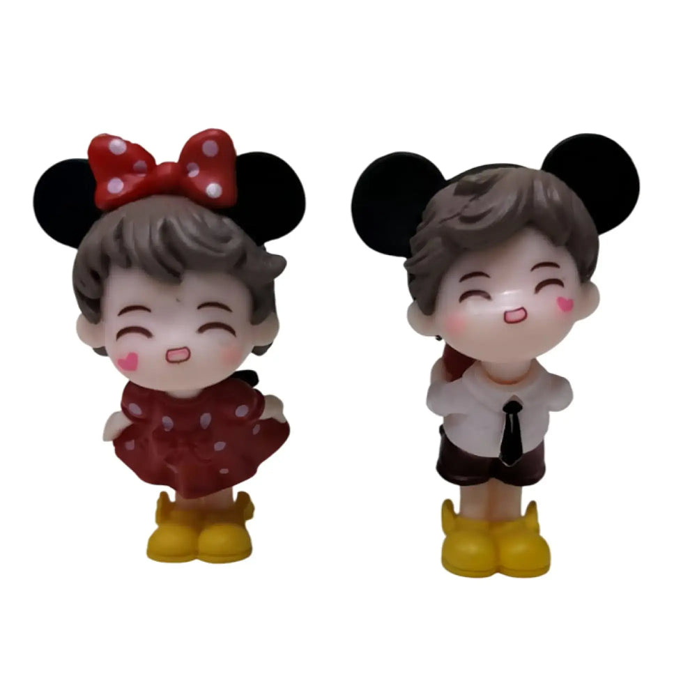 Smiling miniature couple with mouse ears, red polka dress, and white shirt – playful cake topper for kids' birthdays and animated theme cakes.