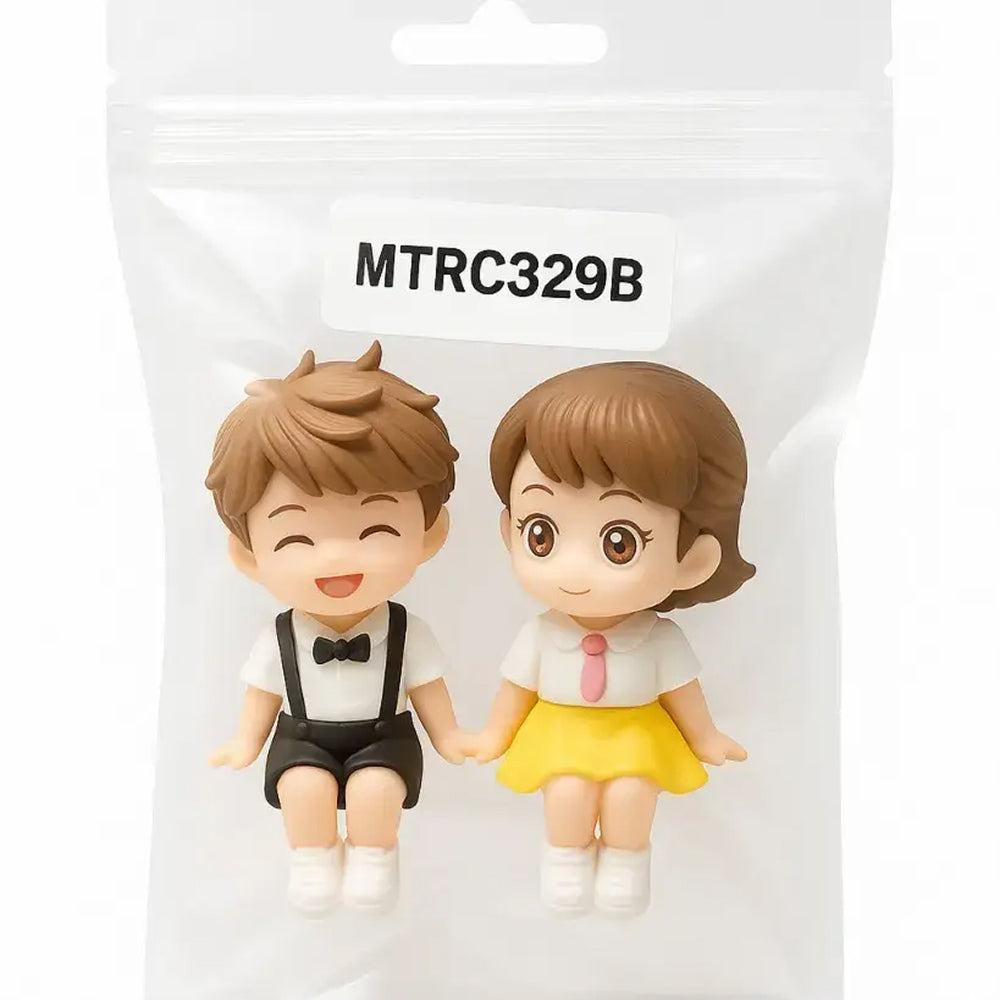 Couple cake toppers packed in transparent bag – boy in formal suspenders and girl in yellow outfit with pink tie – MTRC329B