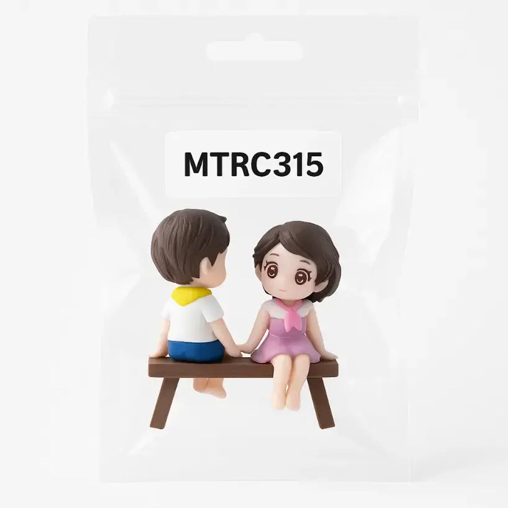 Back view of couple figurine set MTRC315 – holding hands and sitting on a bench – packaged toy cake decoration for love themes
