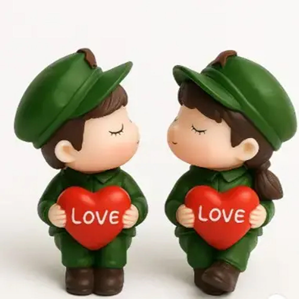 Couple miniature figurines in army green uniforms facing each other with red heart saying ‘LOVE’ – adorable plastic toy toppers perfect for romantic themes and DIY craft use