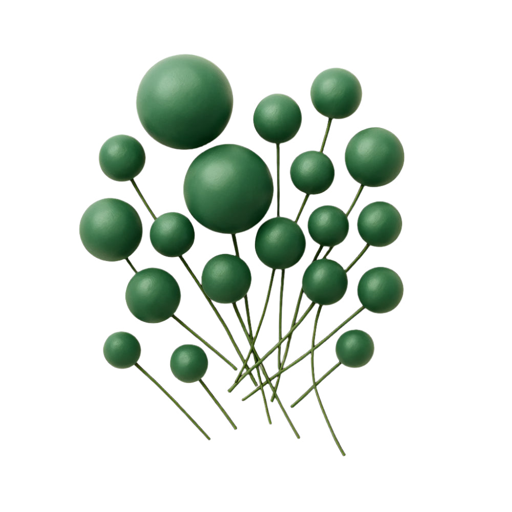 A set of decorative Dark Green faux balls spread evenly on a white background, showcasing their color and texture for cake decoration.