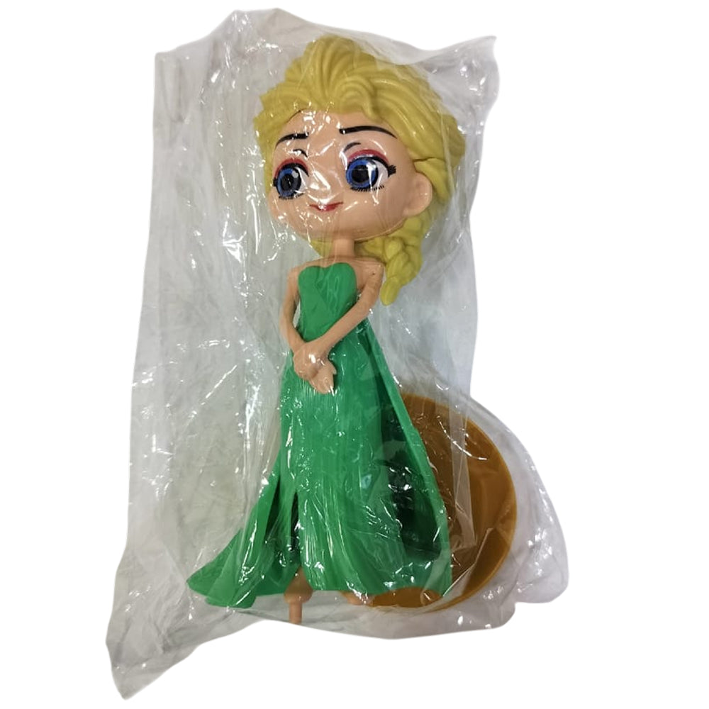 Angled zoomed-in view of Elsa in Green Cake Topper in packaging on white background