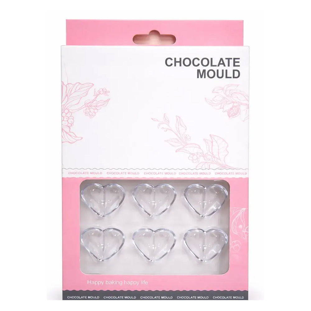 polycarbonate Chocolate mould packaging with clear heart-shaped molds on a pink background