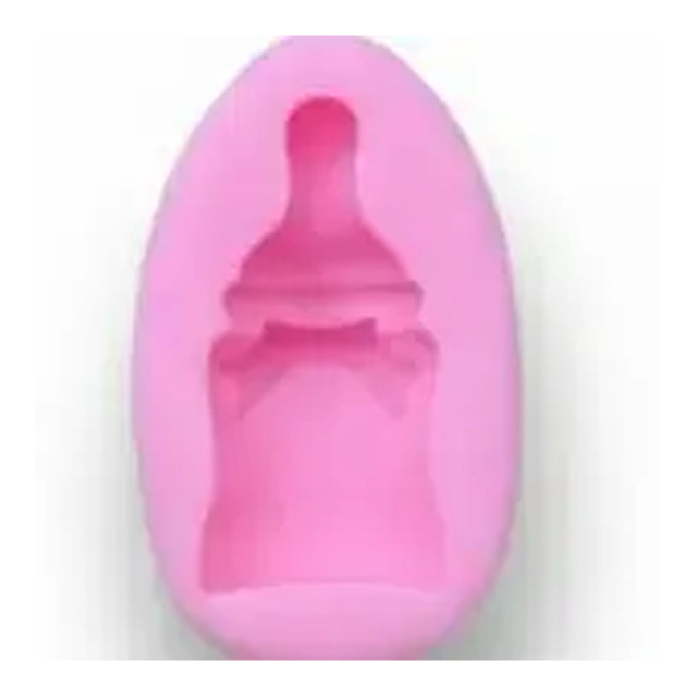 Pink silicone mold shaped like a baby bottle on a white background
