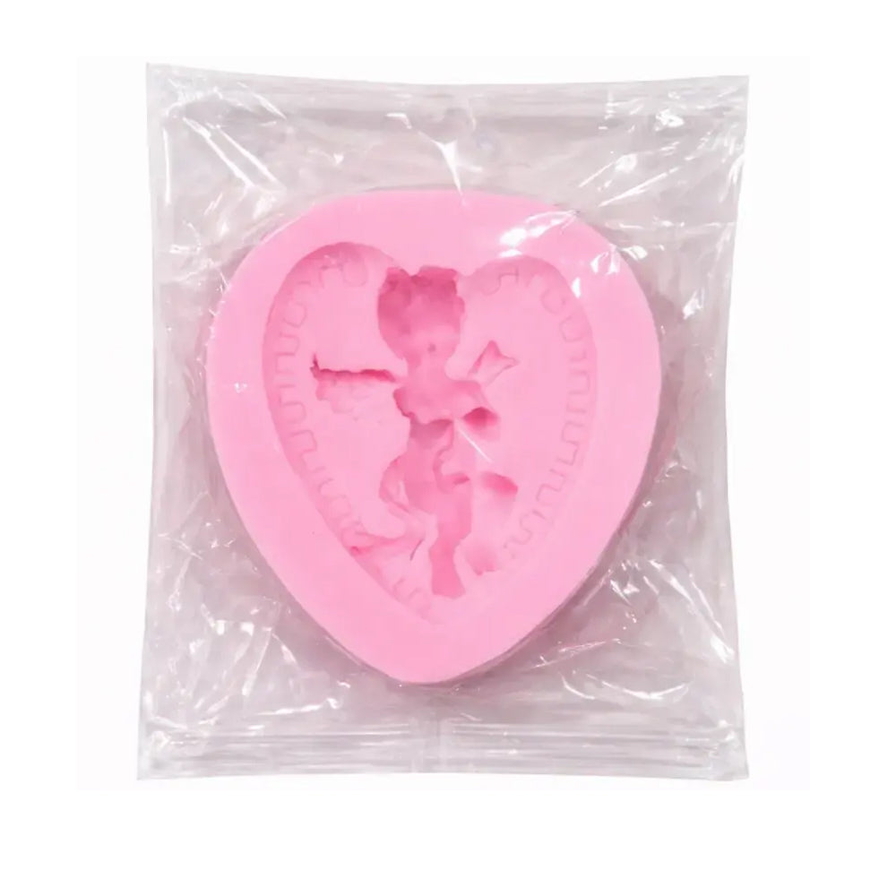 Pink heart-shaped silicone mold with a design on a clear background