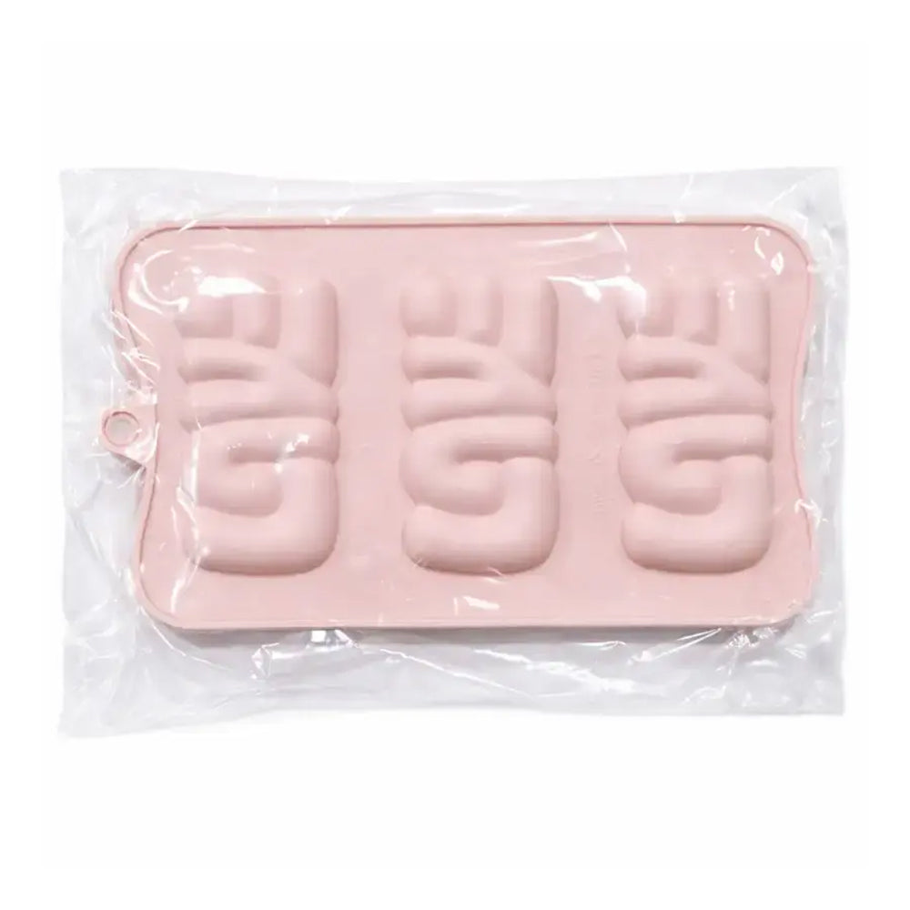 Pink silicone mold with letter 'G' shapes in clear packaging on a white background