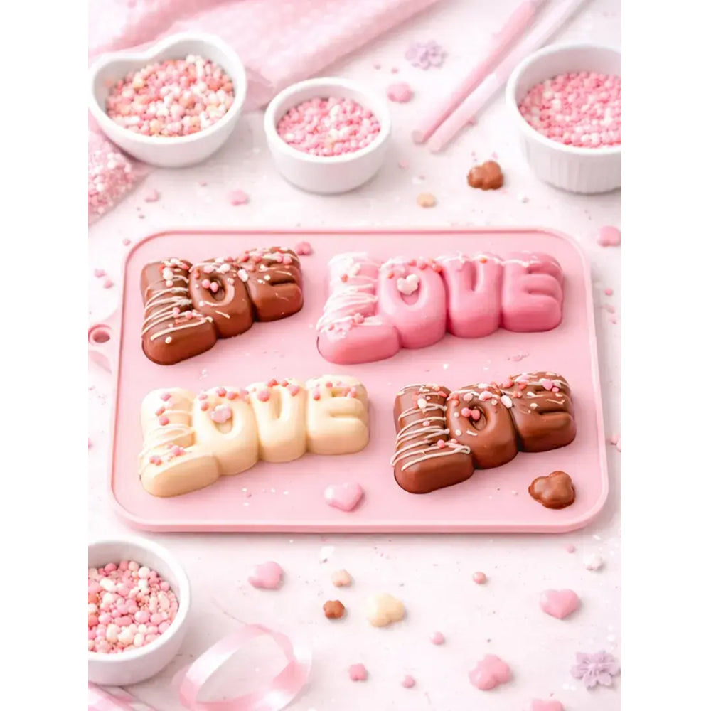 Silicone mold with 'I LOVE YOU' letters on a pink background with decorative elements.