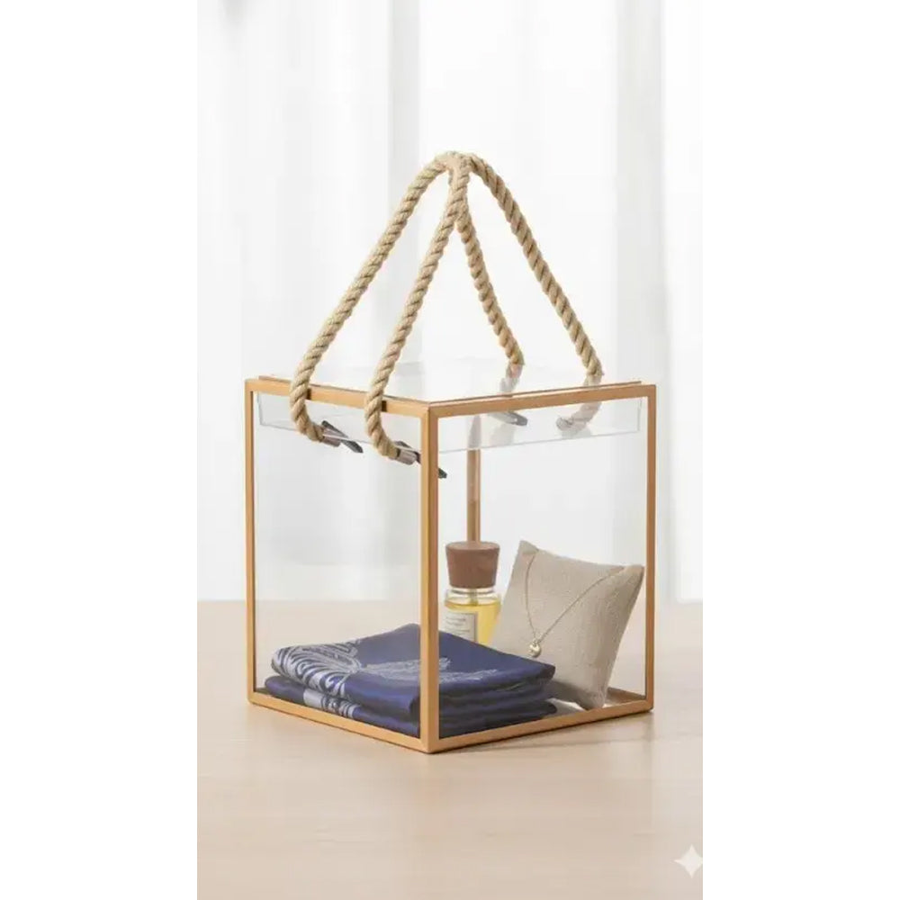 Hanging glass display case with rope handle on a white background