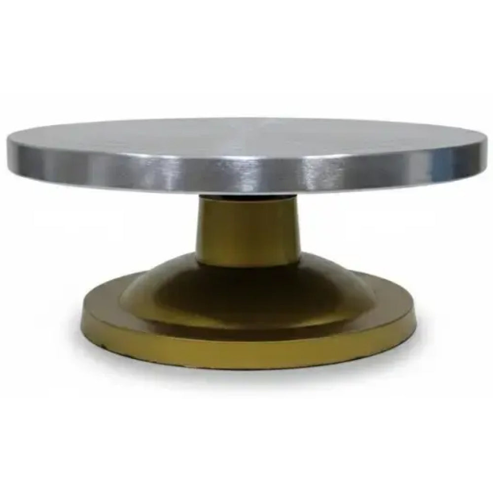 Round metal cake stand with silver top and gold base on a white background