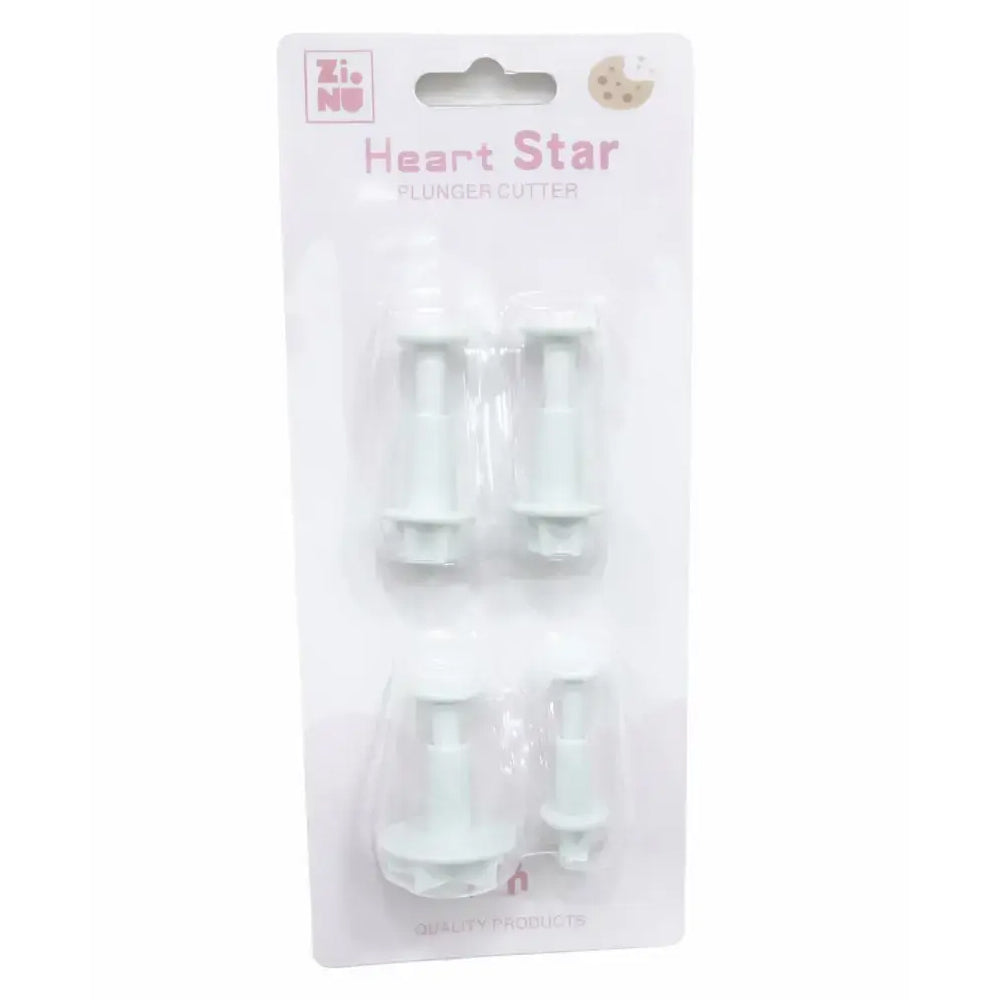 Set of star-shaped plastic cutters in packaging on a white background