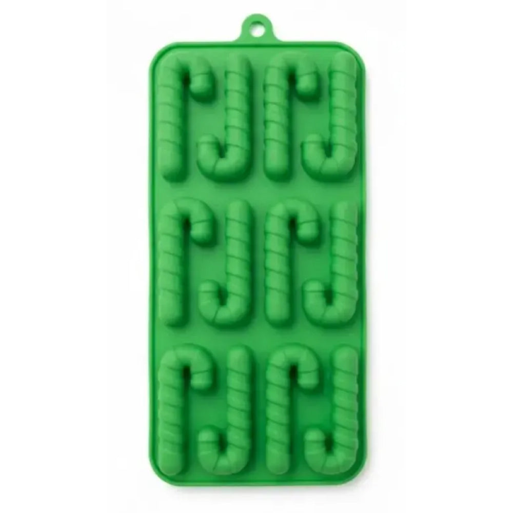 Green silicone candy mold with letter 'J' shapes on a white background