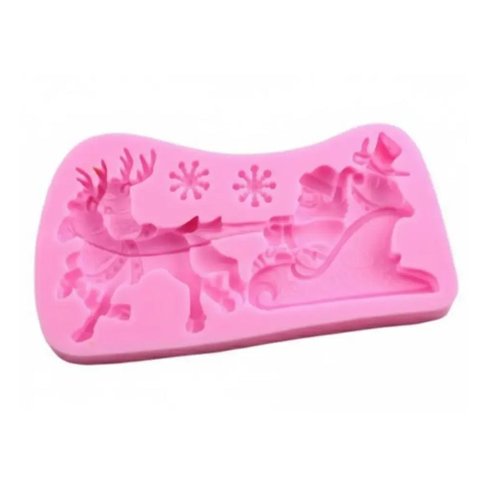 Pink silicone mold with reindeer and sleigh design on a white background