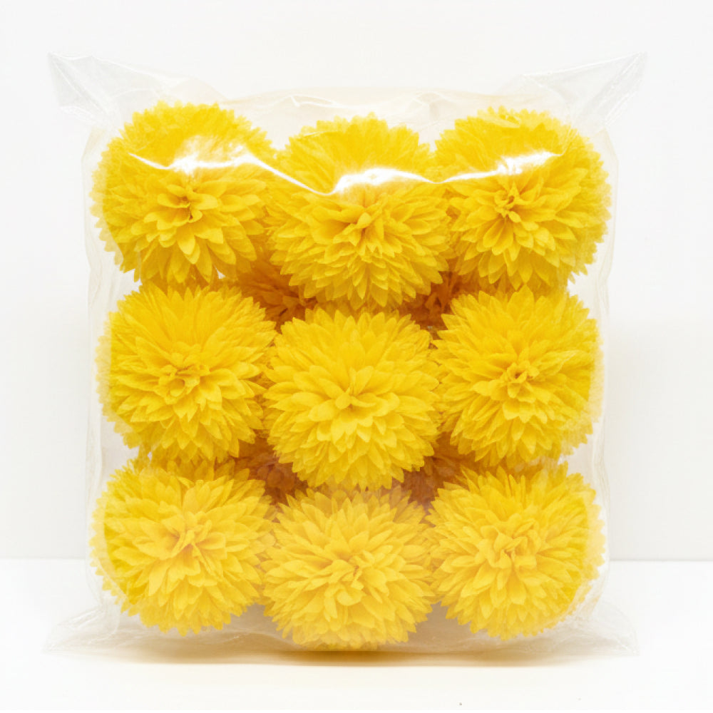 Pack of yellow pom-poms in clear plastic packaging on a white background