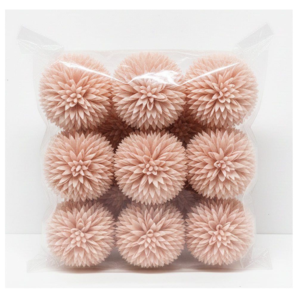 Pack of pink decorative pom-poms in a clear plastic bag on a white background