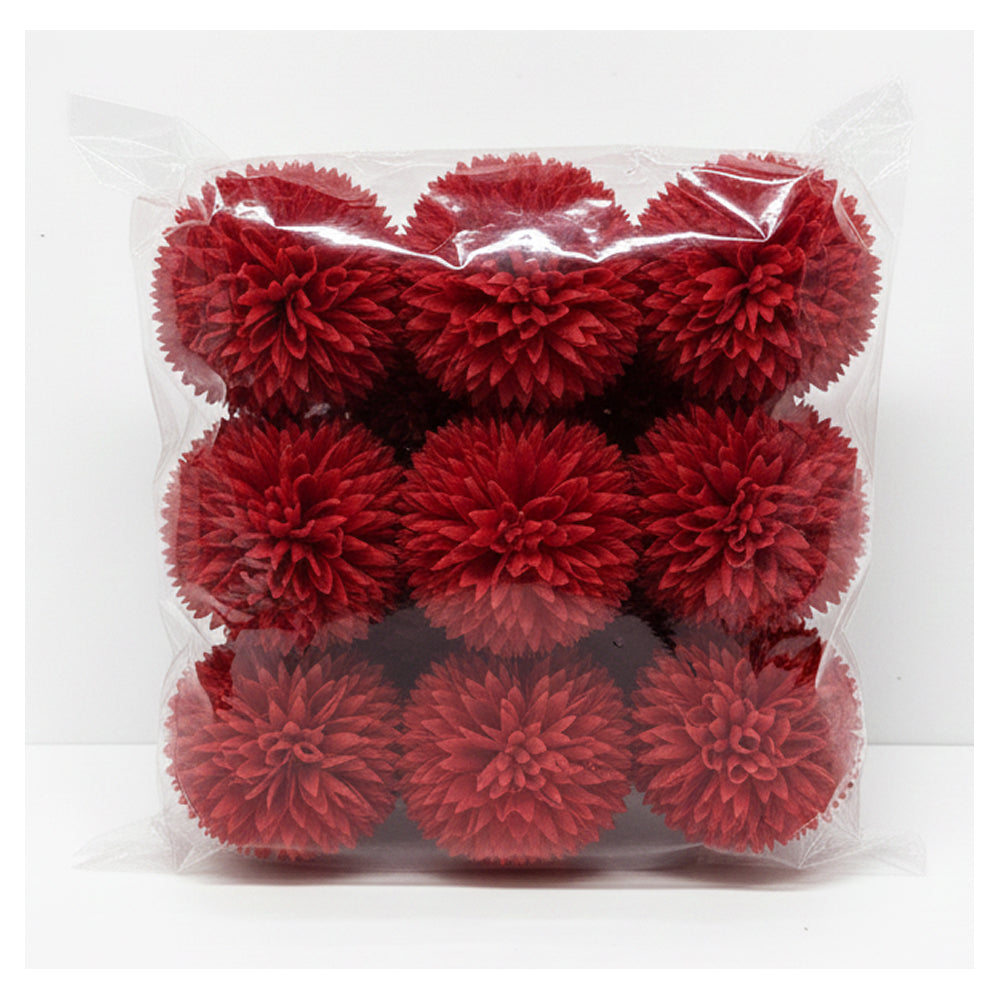 Pack of red pom-poms in clear plastic packaging on a white background