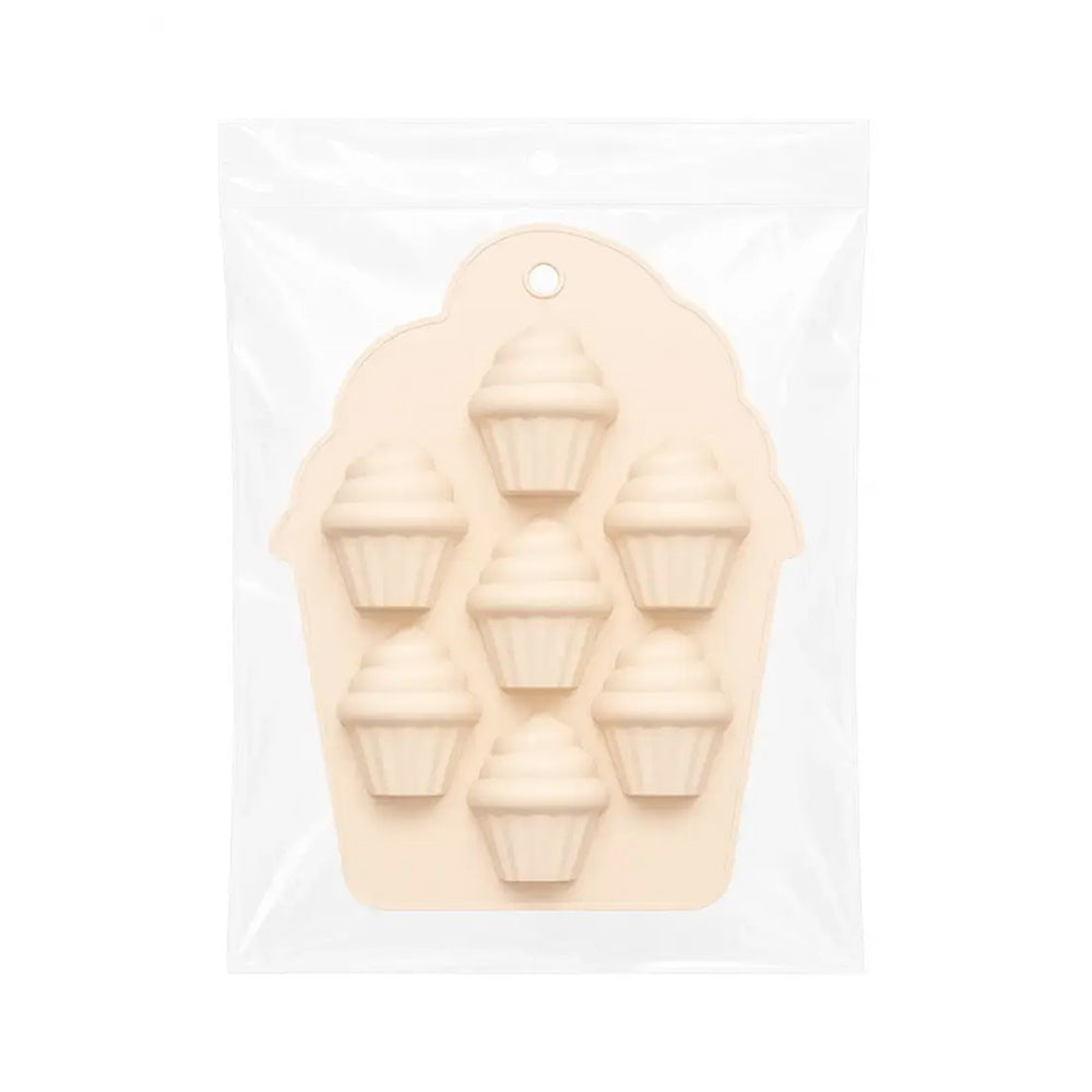 Silicone mold with ice cream cone shapes on a white background