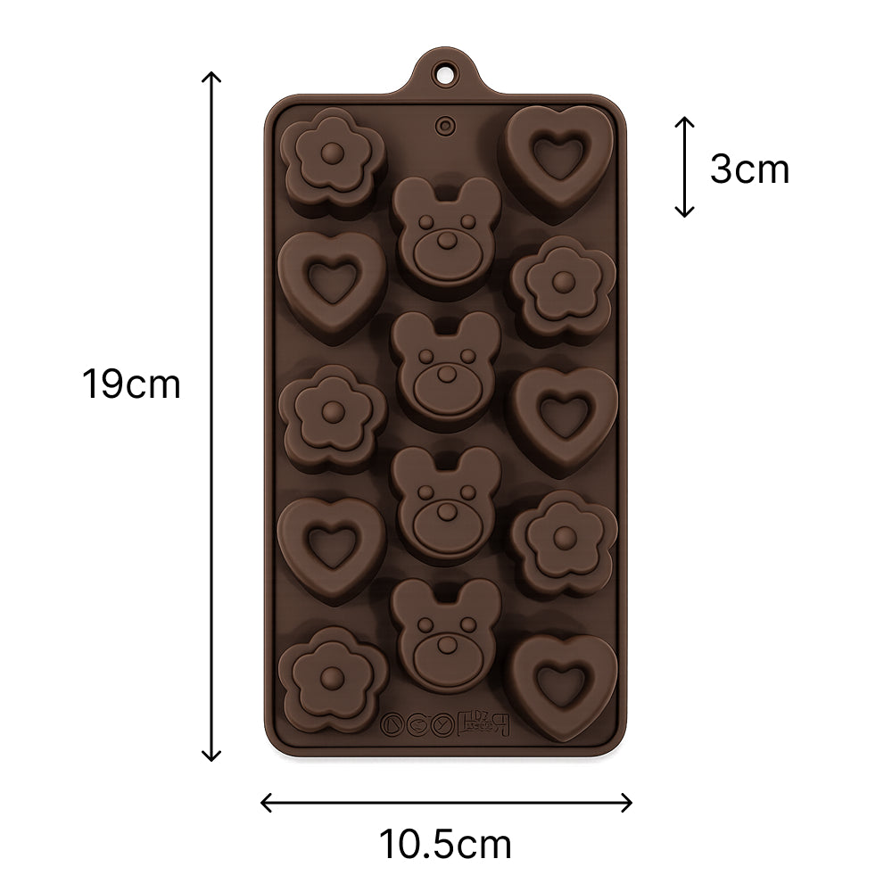 Silicone mold with heart, bear, and flower shapes on a white background