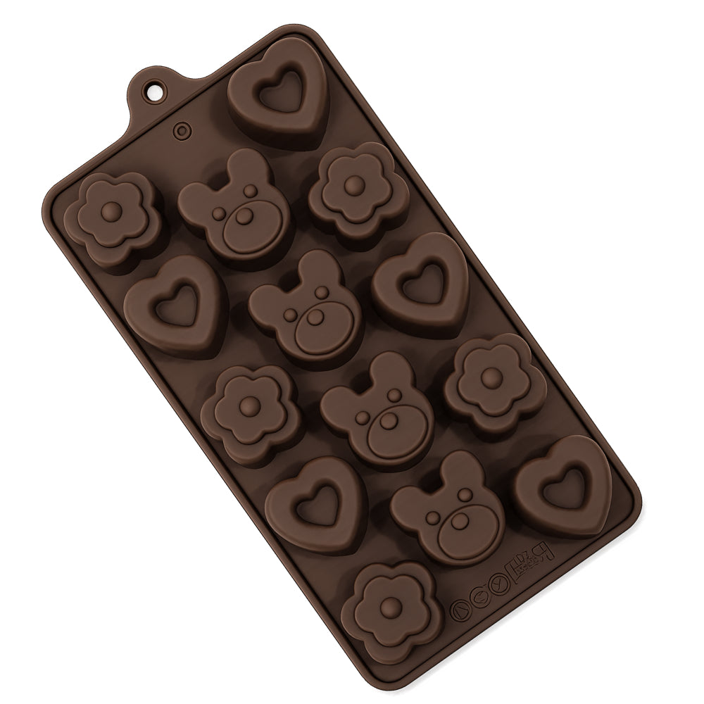 Chocolate mold with various shapes on a white background